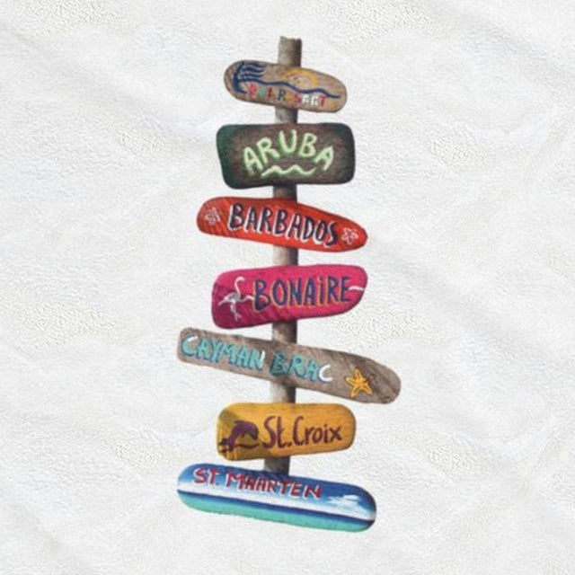 Close-up of the Caribbean Islands Signpost print: painted arrows for Aruba, Barbados, Bonaire, Cayman Brac, St. Croix, and St. Maarten, on the white velveteen throw